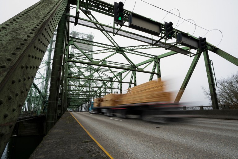 A logging truck drives on the Interstate 5 bridge that spans the Columbia River and connects Portland, Ore., with southwest Washington state, Feb. 13, 2024. Dozens of aging bridges, including this Interstate 5 bridge, in 16 states will be replaced or improved with the aid $5 billion of federal grants announced Wednesday, July 17, by President Joe Biden's administration as the latest beneficiaries of a massive infrastructure law. (AP Photo/Jenny Kane, File)A logging truck drives on the Interstate 5 bridge that spans the Columbia River and connects Portland, Ore., with southwest Washington state, Feb. 13, 2024. Dozens of aging bridges, including this Interstate 5 bridge, in 16 states will be replaced or improved with the aid $5 billion of federal grants announced Wednesday, July 17, by President Joe Biden's administration as the latest beneficiaries of a massive infrastructure law.