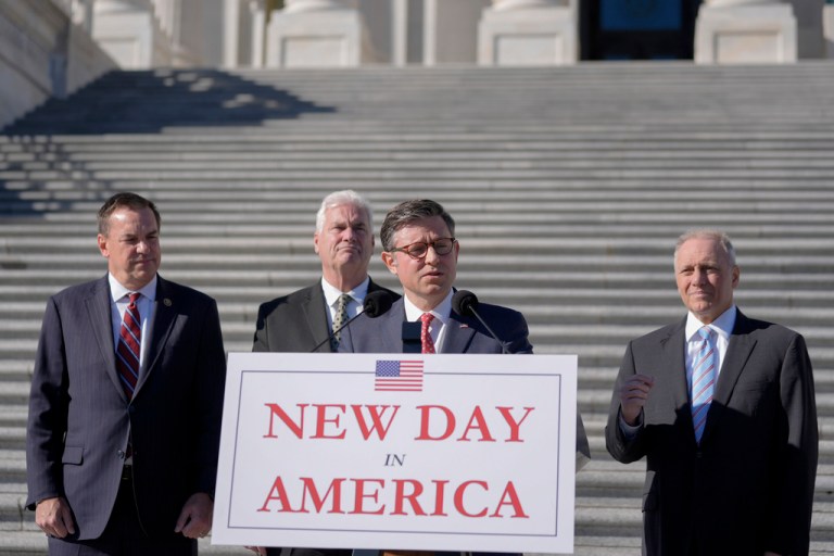 Mike Johnson speaks at a press conference.
