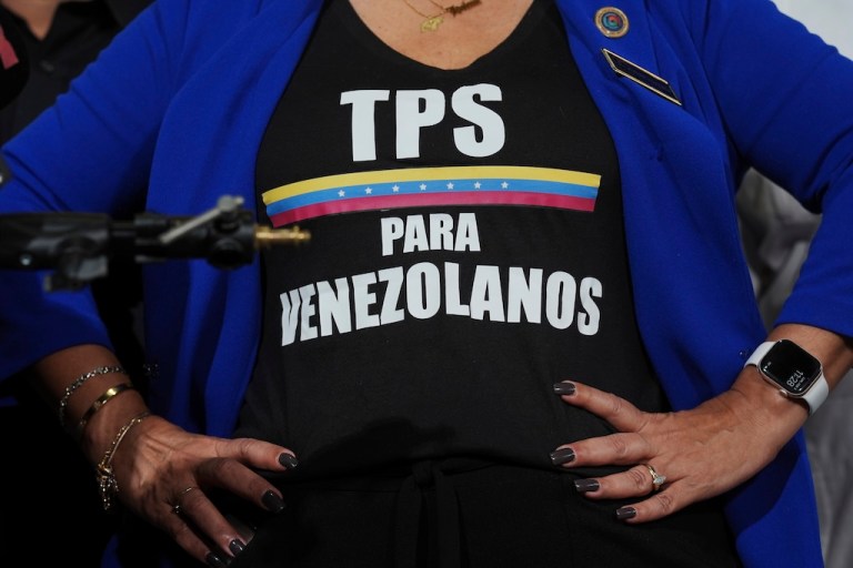 Activist Helene Villalonga wears a T-shirt calling for temporary protected status for Venezuelans.
