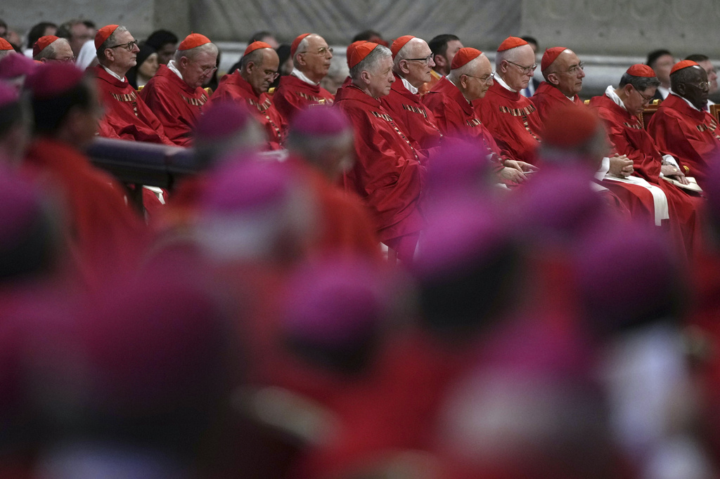 Cardinals and bishops follow Pope Leo XIV celebrating a Mass in St. Peter's Basilica at the Vatican