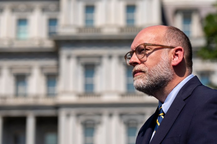 Office of Management and Budget Director Russell Vought speaks with reporters at the White House, Thursday, July 17, 2025, in Washington