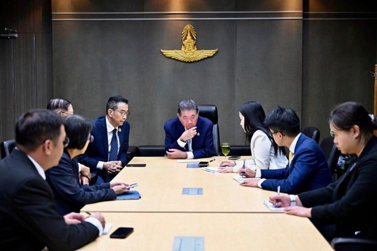 Thailand Acting Prime Minister Phumtham Wechayachai and his staff listen during a phone call with President Donald Trump.