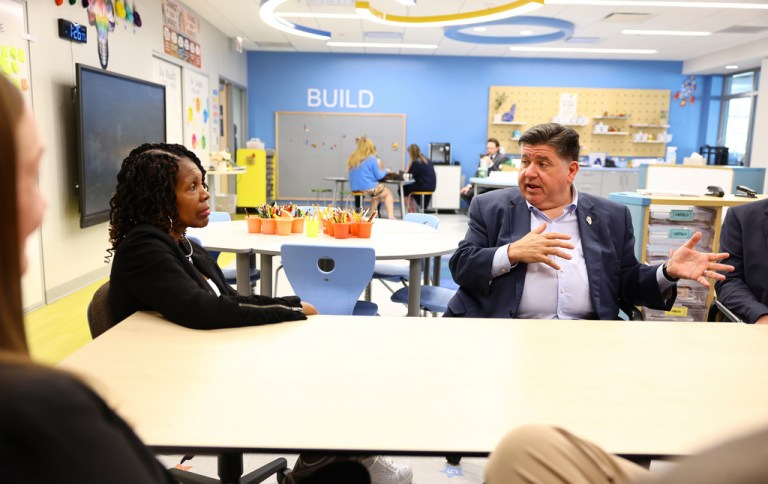 Gov. J.B. Pritzker speaks with local school officials and teachers to learn about the impacts of pending federal actions on school communities to families and students at Prairie Oak Elementary School in the suburb of Berwyn, Thursday, Sept. 4, 2025, in Chicago. (Anthony Vazquez/Chicago Sun-Times via AP, Pool)
