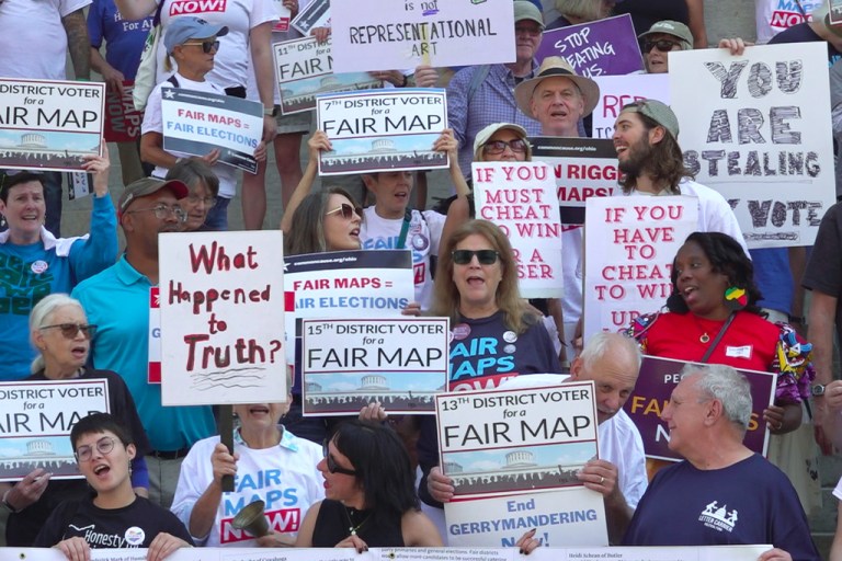 This photo taken from video shows organizers rallying outside of the Ohio Statehouse to protest gerrymandering and advocate for lawmakers to draw fair maps on Wednesday, Sept. 17, 2025, in Columbus, Ohio.