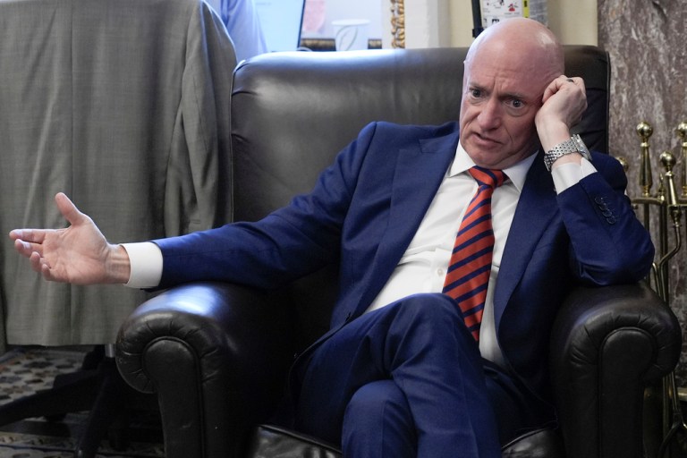 Sen. Mark Kelly, D-Ariz., speaks to reporters on AI during a news conference at the Capitol Hill, Wednesday, Sept. 17, 2025, in Washington. (AP Photo/Mariam Zuhaib)