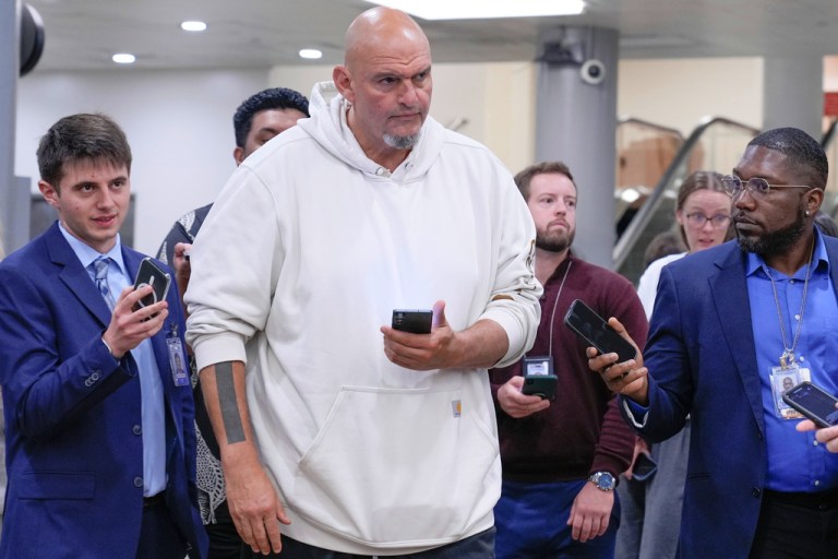 Sen. John Fetterman (D-PA) speaks with reporters at the Capitol Subway.