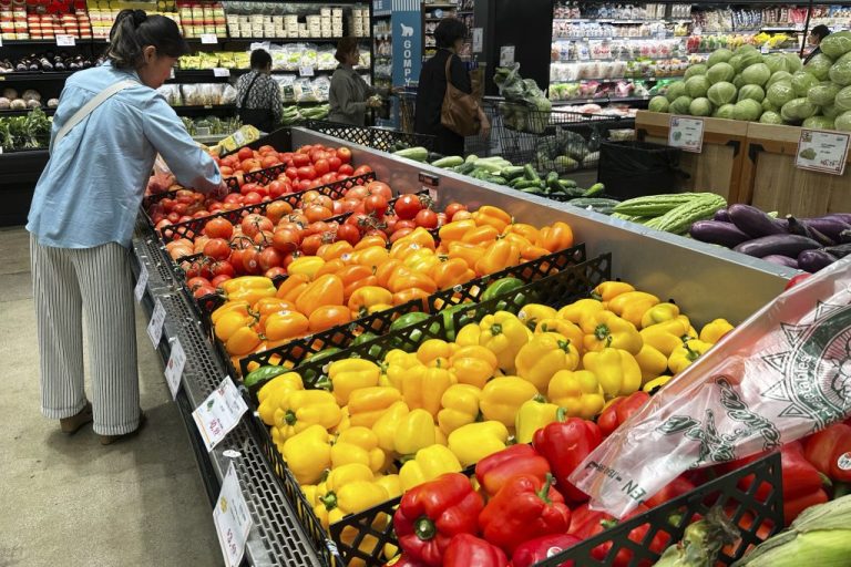 A person shops at a grocery store.