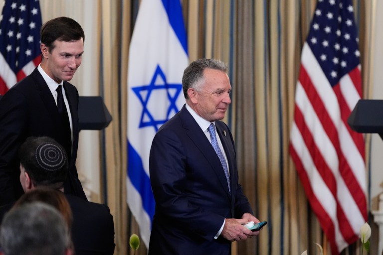 Jared Kushner walks behind U.S. special envoy to the Middle East Steve Witkoff.