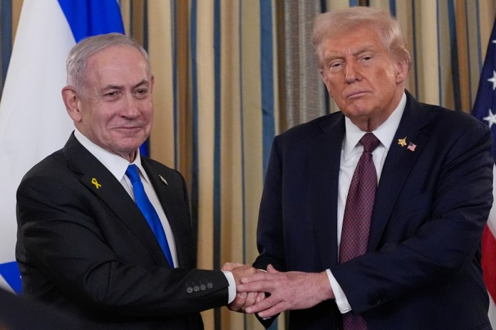 Israel's Prime Minister Benjamin Netanyahu shakes hands with President Donald Trump after a news conference in the State Dining Room of the White House, Monday, Sept. 29, 2025, in Washington.