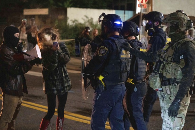Federal agents clash with protesters in Portland.