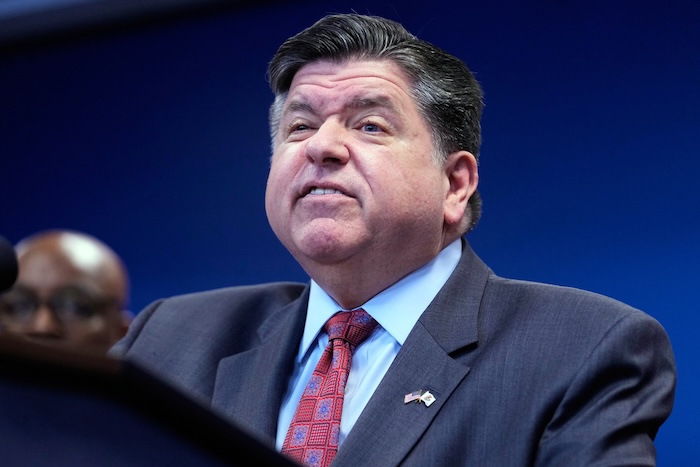Governor JB Pritzker talks to media at a news conference in Chicago, Monday, Oct. 6, 2025. (AP Photo/Nam Y. Huh)
