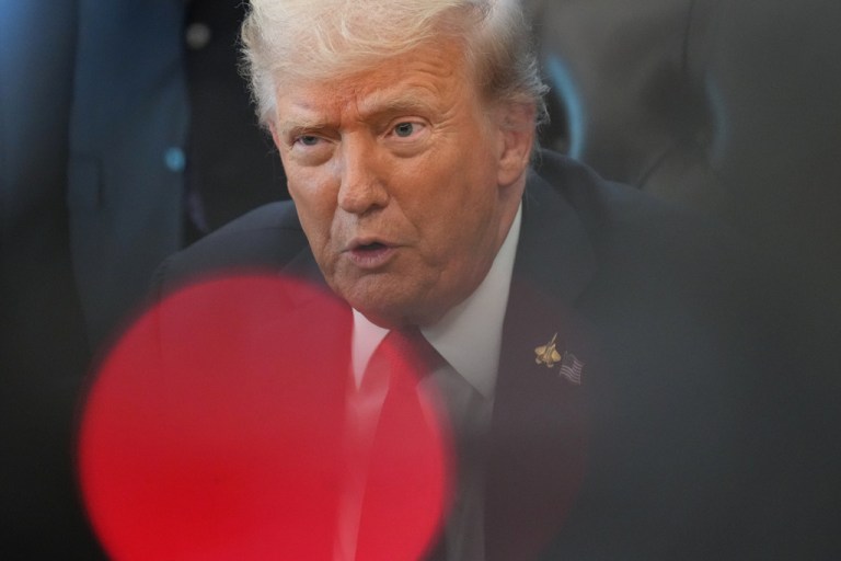 President Donald Trump speaks to reporters.