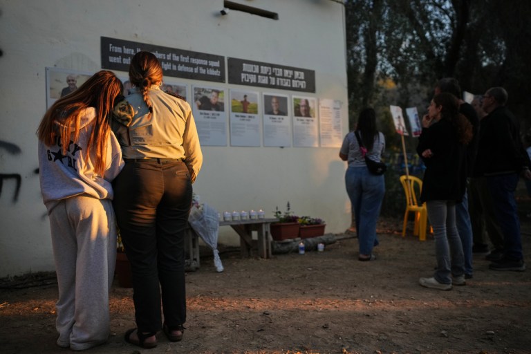 People attend a memorial service marking two years since the Oct. 7, 2023, Hamas cross-border attack on Israel, in Kibbutz Kfar Aza, southern Israel where many of its community members were Killed and abducted, Tuesday, Oct. 7, 2025.