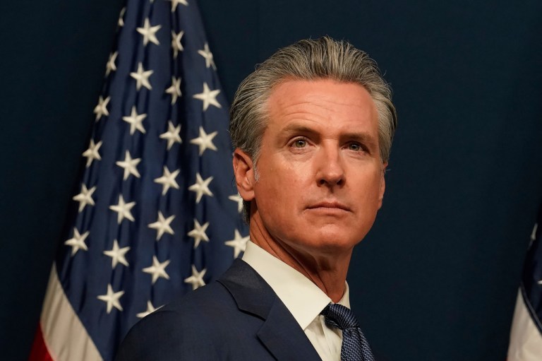 Gov. Gavin Newsom (D-CA) attends a press conference.