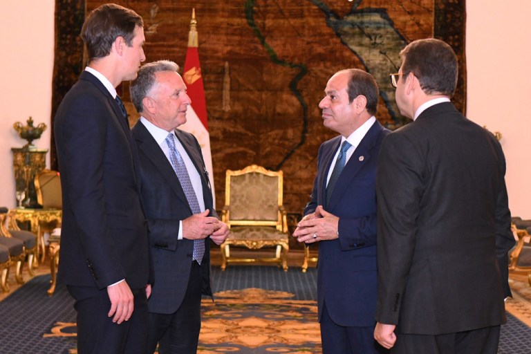 In this photo provided by Egypt's presidency media office, Egyptian President Abdel-Fattah el-Sissi, second right, meets with U.S. Special Envoy to the Middle East Steve Witkoff, second left, and Jared Kushner, left, at the Presidential Palace in Cairo, Egypt, Thursday, Oct. 9, 2025. (Egyptian Presidency Media Office via AP)