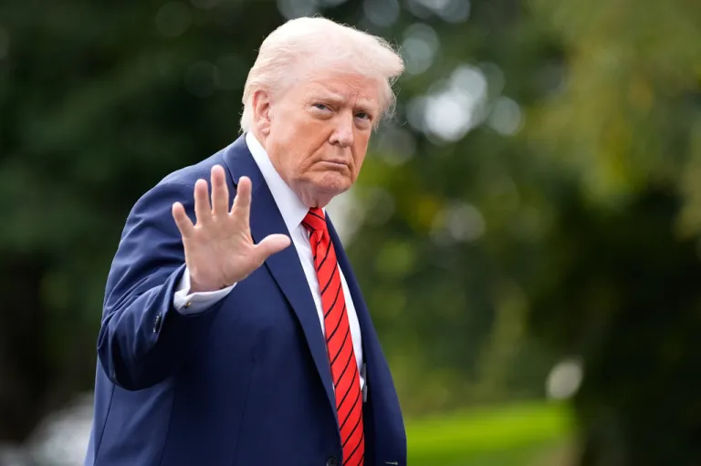 President Donald Trump walks on the South Lawn after arriving on Marine One at the White House, Friday, Oct. 10, 2025, in Washington. (AP Photo/Alex Brandon)
