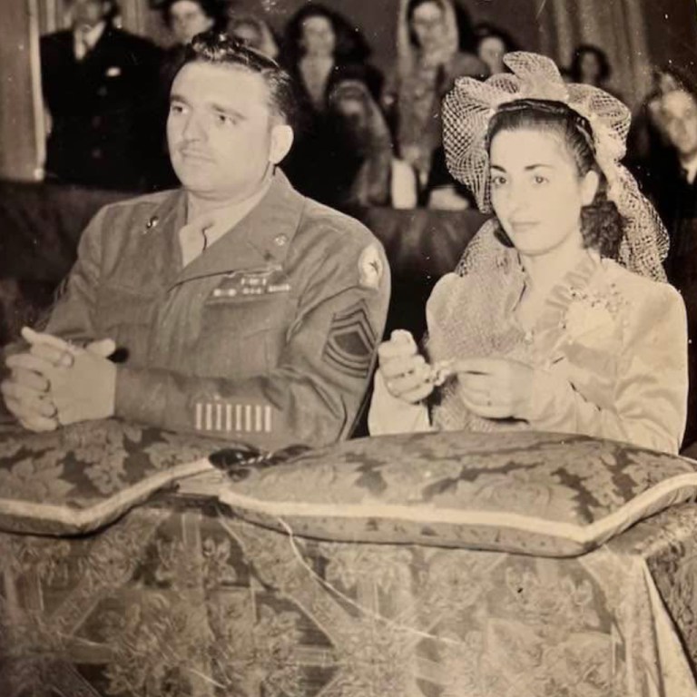 This photo provided by Erin Scott O'Brien shows her grandparents, Charles and Adele Paddock, who fell in love and married in Italy in 1946 and brought a 1,900-year-old Roman tablet to New Orleans. (Courtesy Erin Scott O'Brien via AP)