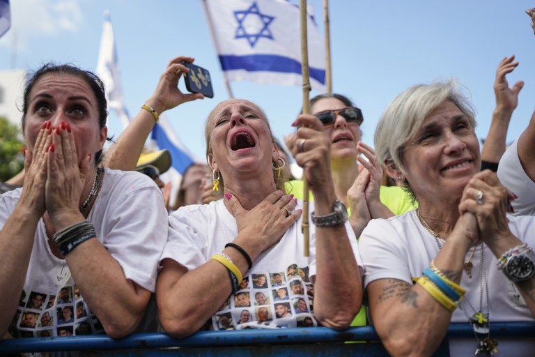 A woman celebrates in Hostages Square in Tel Aviv