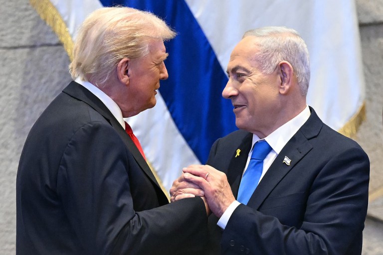 President Donald Trump talks with Israel's Prime Minister Benjamin Netanyahu at the Knesset, Israel's parliament, Monday, Oct. 13, 2025, in Jerusalem.