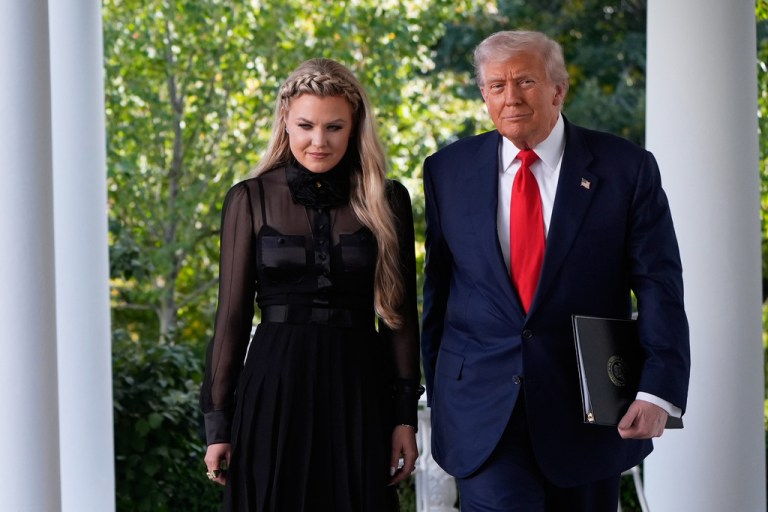 Donald Trump and Erika Kirk standing next to each other outside the White House