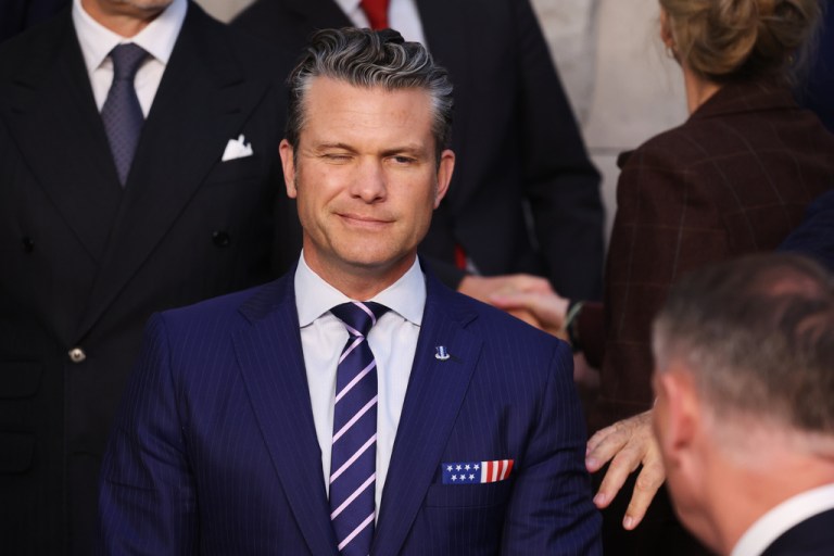United States Defense Secretary Pete Hegseth poses during a group photo of NATO defense ministers at NATO headquarters in Brussels, Wednesday, Oct. 15, 2025