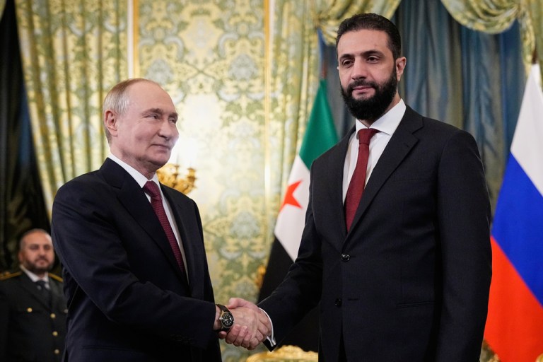 Russian President Vladimir Putin and Syrian President Ahmad al-Sharaa.
