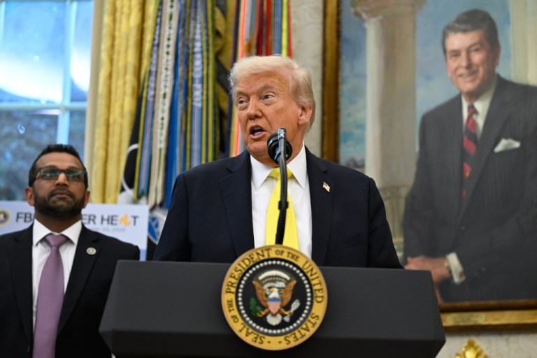 President Donald Trump speaks as FBI Director Kash Patel listens during an event in the Oval Office at the White House, Wednesday, Oct. 15, 2025, in Washington.