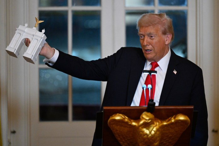 President Donald Trump addresses a dinner.
