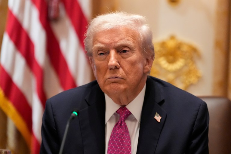 President Donald Trump attends a lunch.