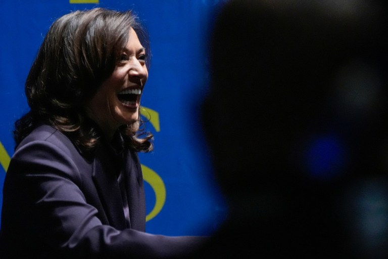 Former Vice President Kamala Harris greets people before she speaks, Friday, Oct. 17, 2025, in Birmingham, Ala. (AP Photo/Mike Stewart)
