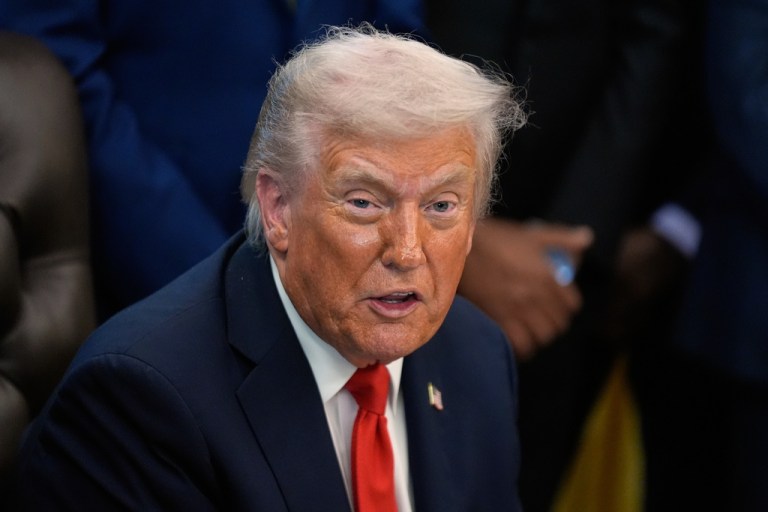 President Donald Trump answers questions from reporters during a Diwali celebration in the Oval Office at the White House, Tuesday, Oct. 21, 2025, in Washington.