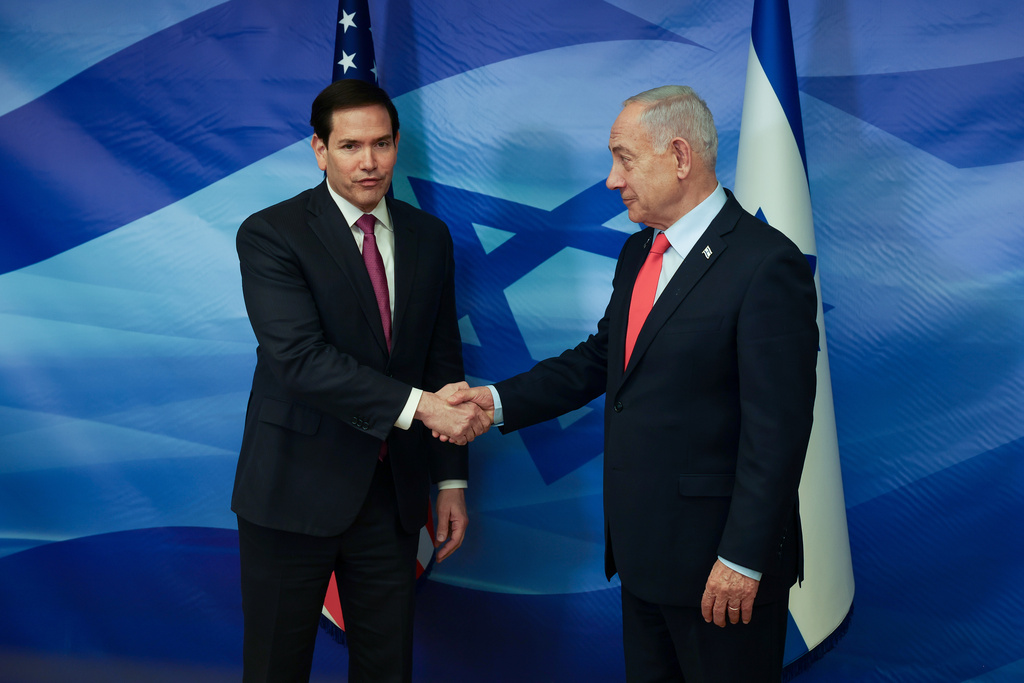 Secretary of State Marco Rubio shakes hands with Israeli Prime Minister Benjamin Netanyahu.