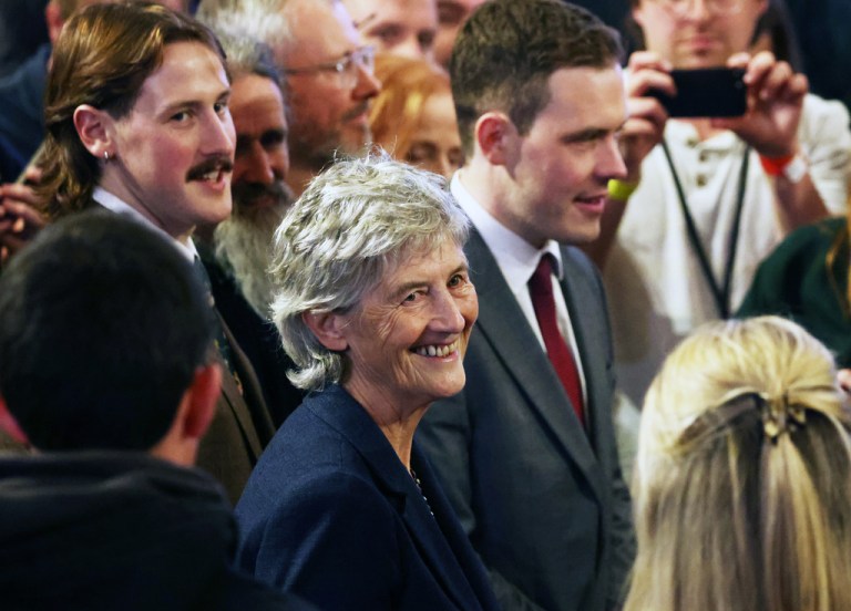 Catherine Connolly smiles to supporters after being elected as the new President of Ireland at Dublin Castle, Ireland, Saturday, Oct. 25, 2025.