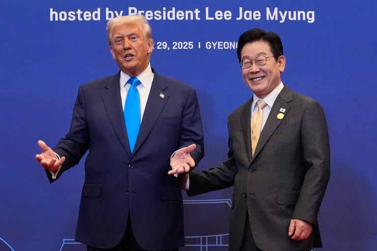 President Donald Trump poses for a photo with South Korean President Lee Jae Myung.