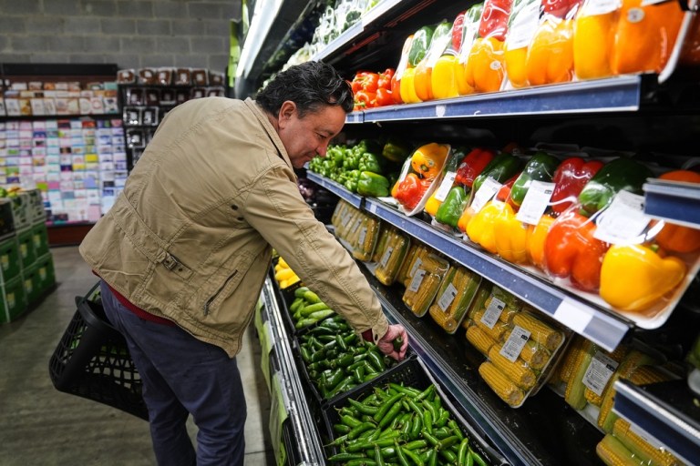 A person shops for produce, which is covered by the USDA Supplemental Nutrition Assistance Program (SNAP), at a grocery store in Baltimore, Thursday, Oct. 30, 2025.