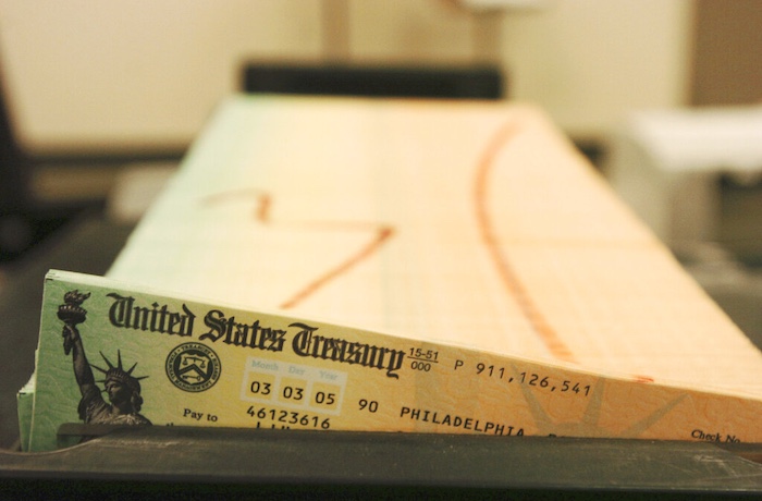 In this February 2005 photo, trays of printed social security checks wait to be mailed from the U.S. Treasury's Financial Management services facility in Philadelphia.