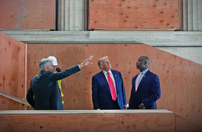 Federal Reserve Chairman Jerome Powell, President Donald Trump, and Sen. Tim Scott (R-SC) visit the Federal Reserve on July 24. (Julia Demaree Nikhinson/AP)