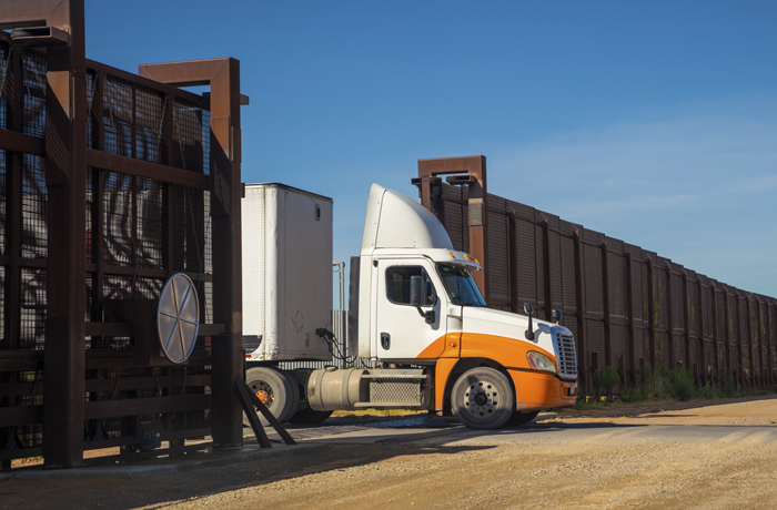 Semi-truck awaiting inspection at the US-Mexico border crossing