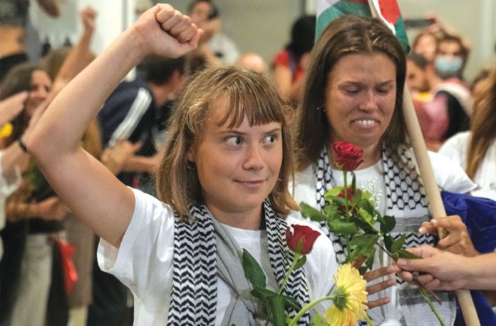 Thunberg arrives at the Eleftherios Venizelos International Airport in Athens, Oct. 6, 2025, after being deported from Israel.  (Petros Giannakouris/AP)