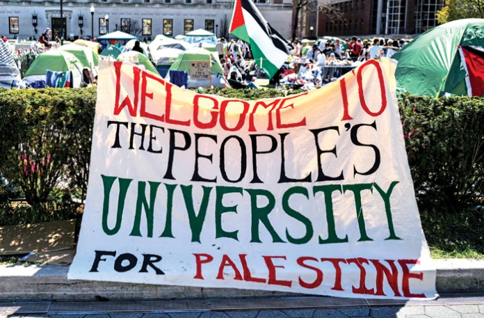 People rally on the campus of Columbia University, which is occupied by pro-Palestinian protesters in New York, April 22, 2024. (Charly Triballeau/AFP/Getty)