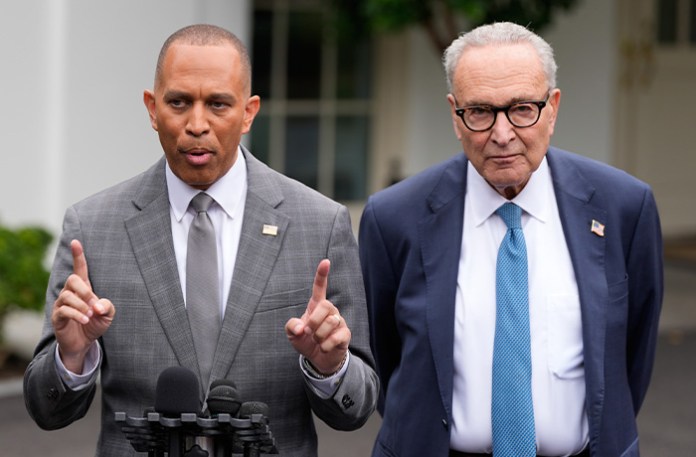 House Minority Leader Hakeem Jeffries (D-NY) and Senate Minority Leader Chuck Schumer (D-NY) talk to reporters outside the White House on Sept. 29. (Alex Brandon/AP)