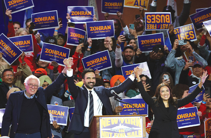Sen. Bernie Sanders (I-VT), New York City mayoral candidate Zohran Mamdani, and Rep. Alexandria Ocasio-Cortez (D-NY), appear at a rally on Oct. 26 in New York. (Heather Khalifa/Associated Press)