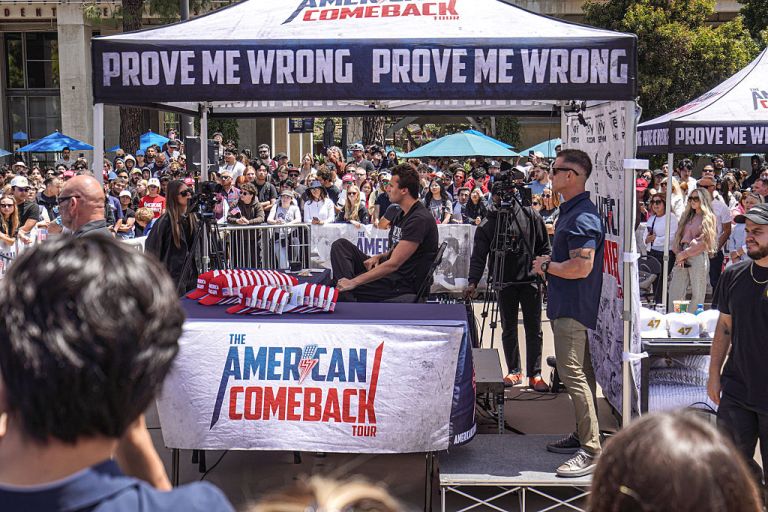 Hundreds of people gather at Town Square in UC San Diego while Charlie Kirk sits in the middle of the plaza. Turning Point USA founder and American conservative political activist, Charlie Kirk sets up in UC San Diego's Town Square fielding rapid-fire questions from students and community members in a signature 