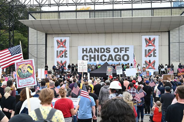 Demonstrators gather at Butler Field in Grant Park for the 'No Kings! Rally and March' in Chicago, Illinois, United States on October 18, 2025. Thousands are expected to join the peaceful protest against the Trump administration's policies, including ICE arrests and authoritarian measures, organized by Indivisible Lincoln Square and the No Kings network. (Photo by Jacek Boczarski/Anadolu via Getty Images)