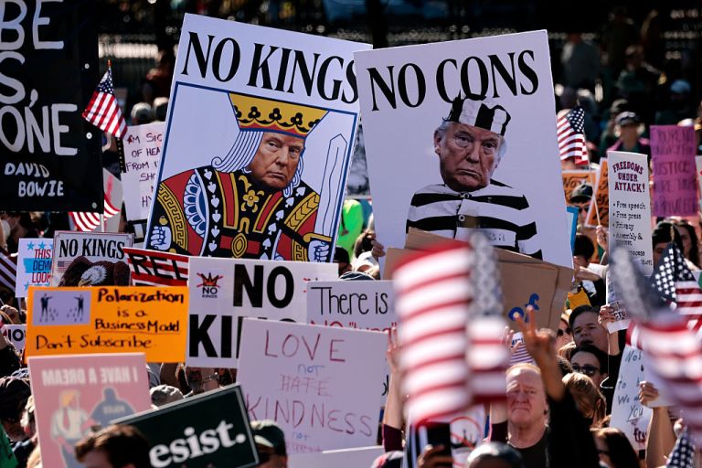 The crowd filled the Parade Grounds with an array of signs during the No Kings rally on Boston Common on October 18, 2025. (Photo by Craig F. Walker/The Boston Globe via Getty Images)