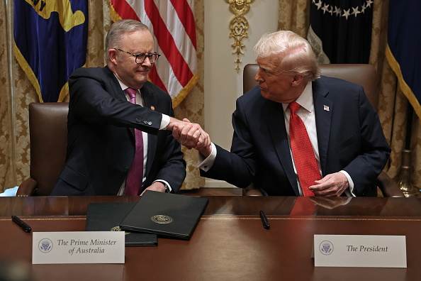 Prime Minister of Australia Anthony Albanese and President Donald Trump shake hands.