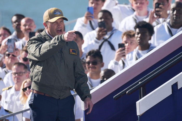 Defense Secretary Pete Hegseth arrives before President Donald Trump speaks during a celebration for the 250th anniversary of the U.S. Navy aboard the USS Harry S. Truman at Naval Station Norfolk, Sunday Oct. 5, 2025 in Norfolk, Va.