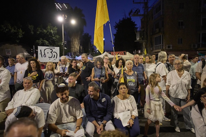 Relatives and supporters of Israeli hostages held by Hamas in Gaza, gather for a prayer