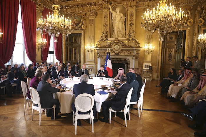 French President Emmanuel Macron speaks during Mideast talks with European and Arab foreign ministers.