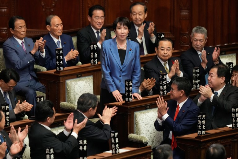 3 of 7 | Lawmakers applaud as Sanae Takaichi, center, is elected as Japan’s new prime minister during the extraordinary session of the lower house, in Tokyo, Japan, Tuesday, Oct. 21, 2025.(AP Photo/Eugene Hoshiko)